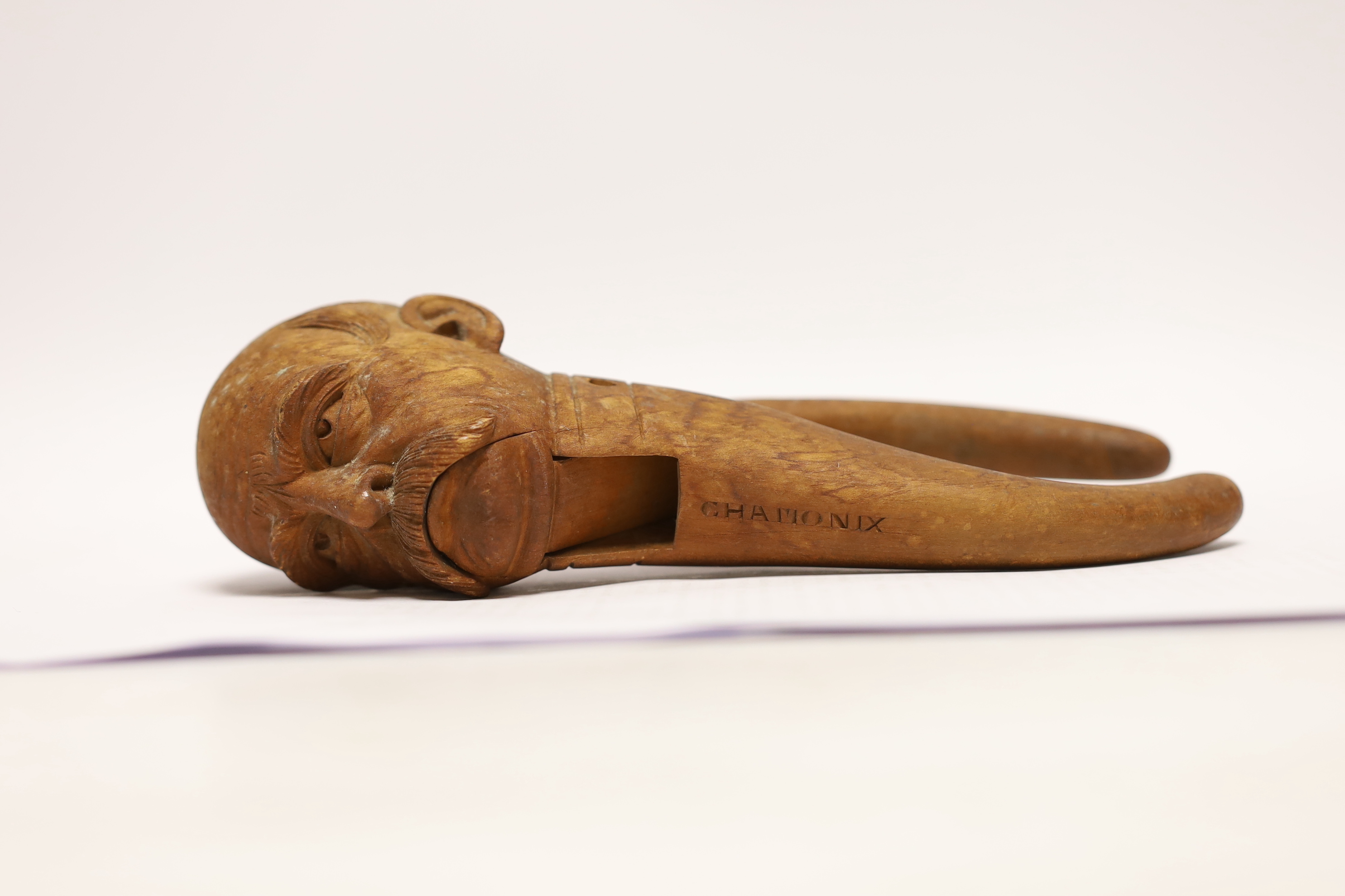 A Treen nutcracker in the form of a gentleman, inscribed ‘Chamonix’, 20cm high